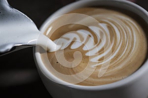 Making latte Art on a Cappucinno