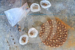 Making of Moroccan mosaic in a factory placing the tiles upside