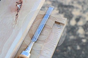 Making mortise and tenon joint with chisel