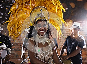 Making the night come alive. Portrait of a samba dancer performing in a carnival.