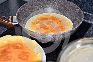 Making pancakes, cake, baking top view. Concept of Cooking ingredients and method on white marble background