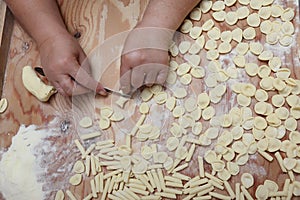 Making pasta: italian orecchiette and cavatelli photo