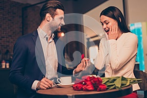 Making proposal in a cafe with ring and flowers unexpected moment honeymoon jewelry ring diamond golden concept wife husband