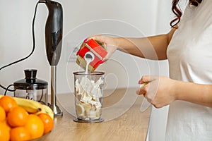 Making a Smoothie: Pouring Milk into Blender