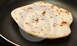 Making sourdough leavened pita-like flatbread