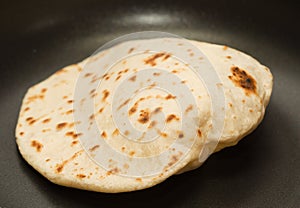 Making sourdough leavened pita-like flatbread photo