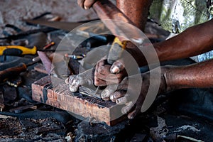 Making souvenirs from mangrove wood
