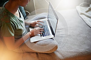 Making study notes. High angle shot of a young female student studying at home.