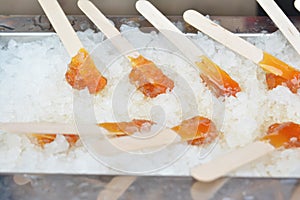 Making maple syrup on snow.