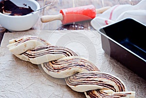 Making Swirl Brioche with chocolate, traditional Polish sweet Christmas bread