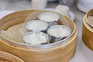 Making traditional korean rice flour steamed cake tteok photo