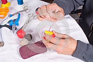 Making traditional pelota balls photo