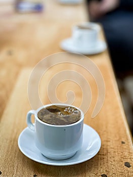 Making turkish coffee with cardamon by traditional way