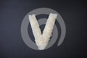 Making the V capital letter by formed rice seeds