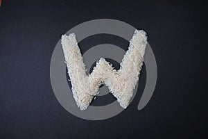 Making the W capital letter by formed rice seeds