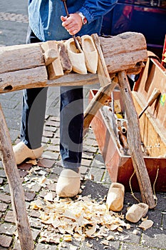 Making of wooden shoes.