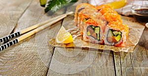 Makizushi Sushi Roll California with Cucumber, Avocado and Salmon