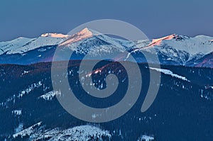 Mala Fatra mountains from Nizke Tatry during winter sunset