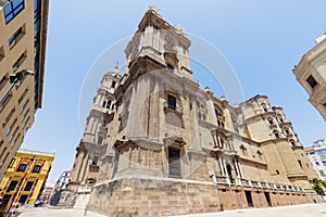 Malaga Cathedral and sunny day photo