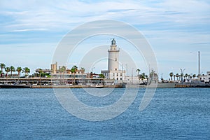 Malaga lighthouse called La Farola - Malaga, Andalusia, Spain photo