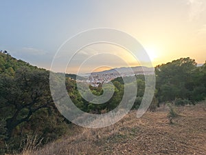 Malaga old town and historical city center panoramic view with Sierra de Mijas mountain range from Monte Victoria, Spain, Europe