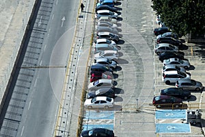 Malaga, Spain, February 2019. Top view of the parking lot, cars, roads.