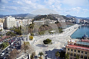 Malaga, Spain, February 2019. Beautiful view of the historical part of the city of Malaga with a review wheel.