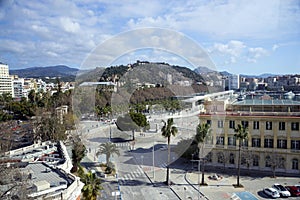 Malaga, Spain, February 2019. Beautiful view of the historical part of the city of Malaga with a review wheel.