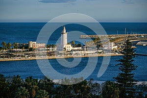 MALAGA, SPAIN - March 08, 2023. Lighthouse Farola in Malaga port