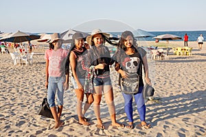 Malagasy beauties, teenager girls resting on the beach