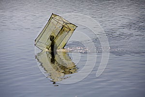 Malagasy Fishermen moving the fishing box nets photo