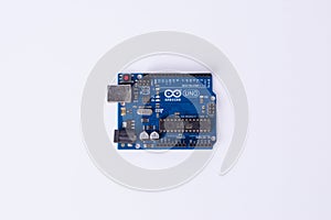 Top view of Arduino Uno microcontroller board on white background