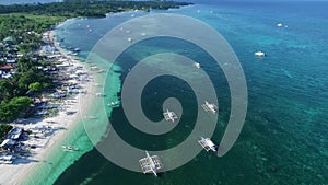 Malapascua Island in Cebu, Philippines. Sulu Sea Boat and Beautiful Bounty Beach, Seascape with Boats in Background IX