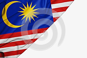 Malasia flag of fabric with copyspace for your text on white background photo