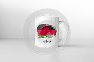 Malawi flag on white coffee mug.