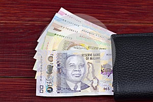 Malawian kwacha in the black wallet