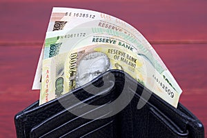 Malawian money in the black wallet