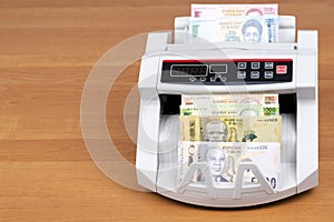 Malawian money - new series of banknotes in the counting machine