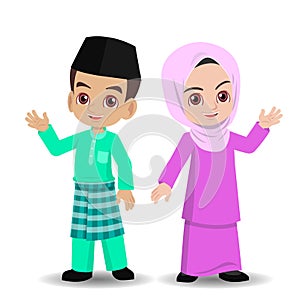 Malay girl and boy with hari raya new clothes