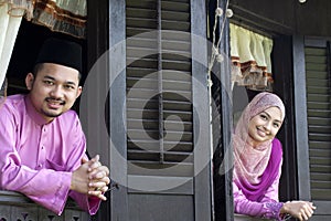 Malay muslim couple smile