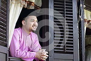 Malay muslim man smile