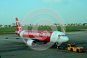Malaysia airline Air Asia Airbus plane at Ho Chi Minh airport Vietnam