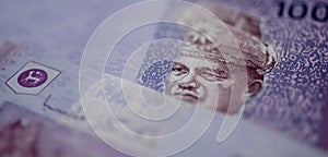 Malaysia currency of Malaysian ringgit banknotes background. Paper money of hundred ringgit notes etreme closeup. Financial