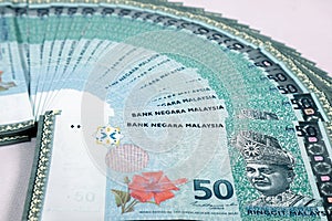 Malaysia Currency MYR: Stack of Ringgit Malaysia bank note.