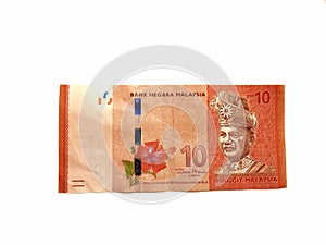 Malaysia currency (MYR) :stack of ringgit Malaysia bank note with isolated white background.