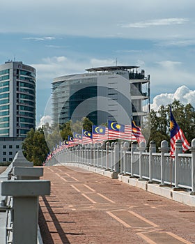 Malaysia flags known as Jalur Gemilang waving on the street due to the Independence Day celebration or Merdeka Day