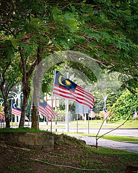Malaysia flags known as Jalur Gemilang waving on the street due to the Independence Day celebration or Merdeka Day