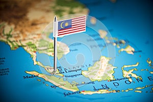 Malaysia marked with a flag on the map