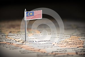 Malaysia marked with a flag on the map