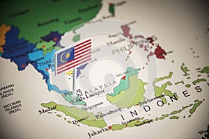 Malaysia marked with a flag on the map